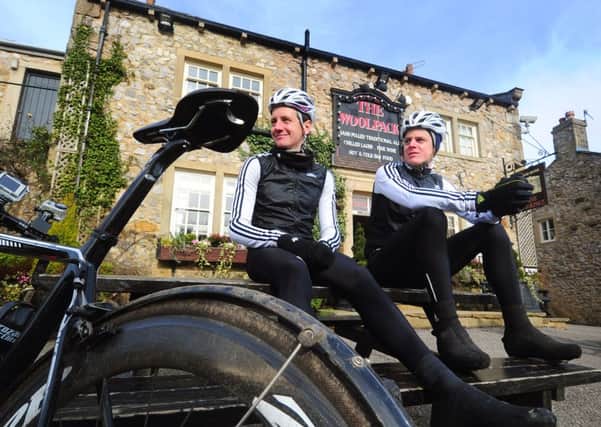 The Brownlee brothers, Alistair and Jonny, at the Woolpack pub on the Emmerdale set in the grounds of Harewood House near Leeds