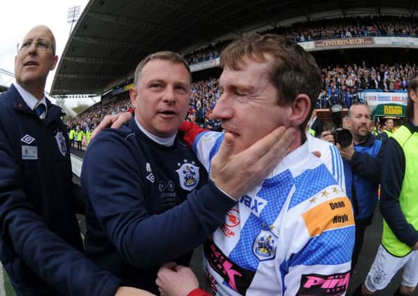Huddersfield Town manager Mark Robins and owner Dean Hoyle.