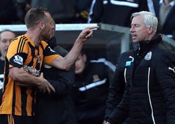 FLASHPOINT ... Newcastle United's manager Alan Pardew and Hull City's David Meyler, left, confront each other during the Premier League match at the KC Stadium.