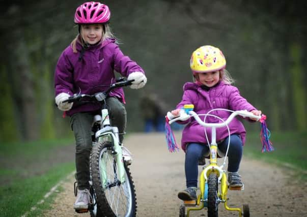 Isabelle Miller with her sister Imogen at Temple Newsam in Leeds. Picture: Simon Hulme