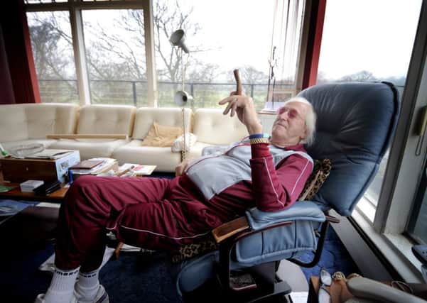 Jimmy Savile in his penthouse flat in Leeds