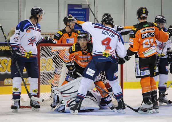 Dundee and Sheffield get to grips with each other earlier this season.