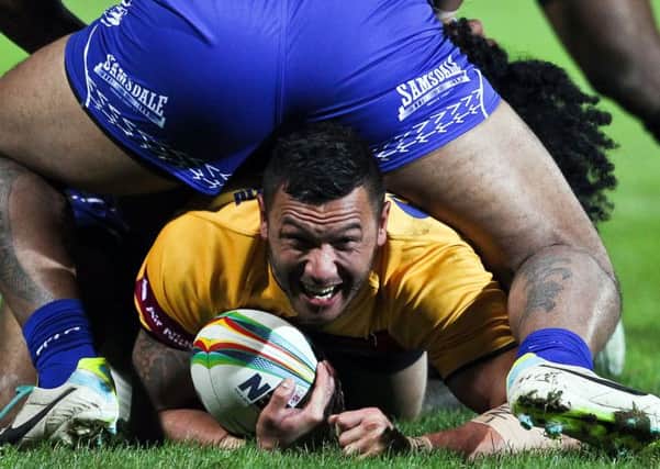 Huddersfield's Jason Chan in World Cup action for PNG.