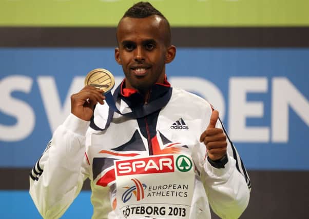 Great Britain's Mukhtar Mohammed with his bronze medal won at the European Indoor Championships in 2013.