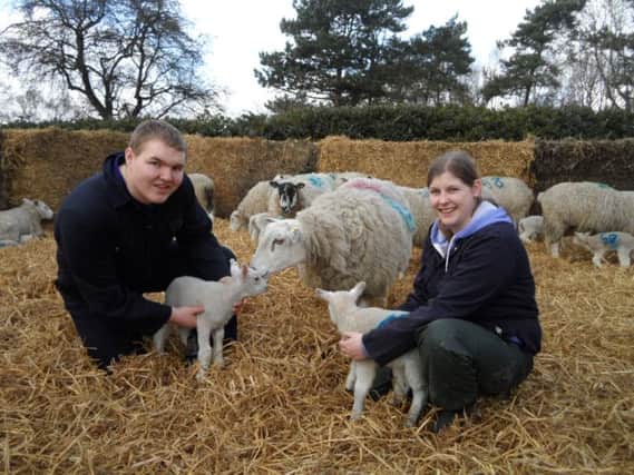 John Wray, head of agriculture at Askham Bryan College with students Simon Metcalfe and Rebecca Holmes