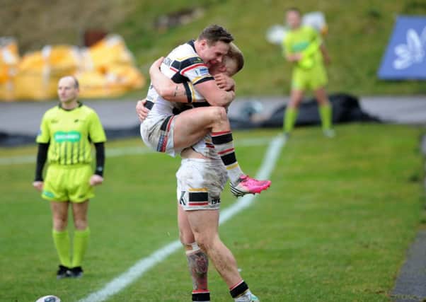 Bradford's Danny Addy celebrates his try with James Donaldson.
