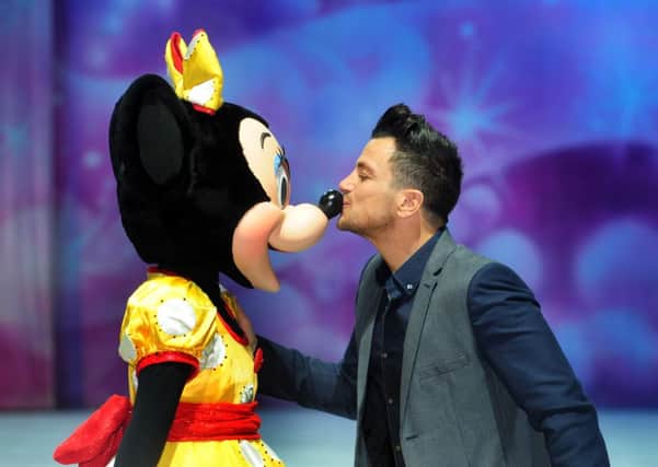 Peter Andre with Minnie Mouse. PIC: Tony Johnson