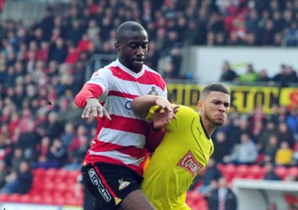 Nahki Wells goes down in the box under Abdoulaye Meite's challange but appeals for a penalty were waved away