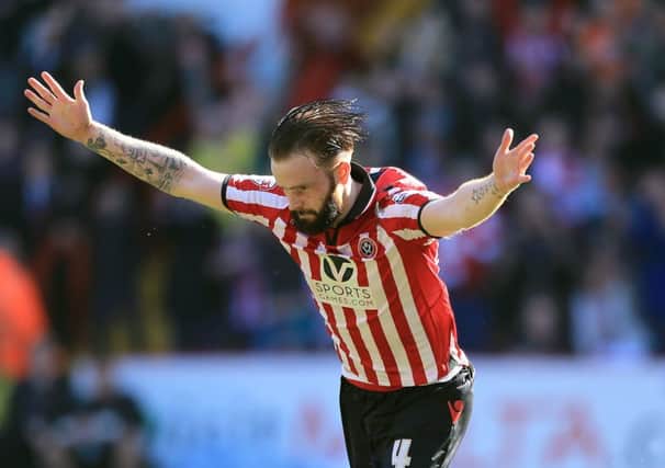 Sheffield United's John Brayford celebrates scoring their second goal of the game during the FA Cup Sixth Round match at Bramall Lane, Sheffield.