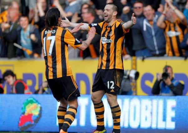 Hull City's Matty Fryatt (right) celebrates scoring their third goal with George Boyd during the FA Cup Sixth Round match at the KC Stadium, Hull.