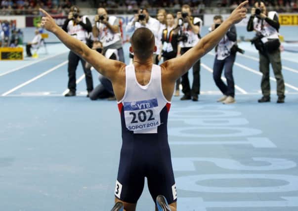 Britain's Richard Kilty celebrates after winning the men's 60m final in Sopot.