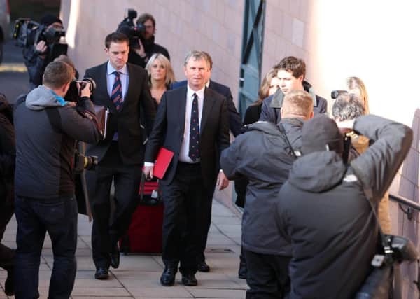 Nigel Evans, former deputy speaker of the House of Commons (centre front ) arrives at Preston Crown Court