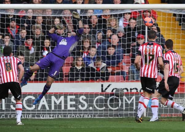 Sheffield United's goalkeeper, Mark Howard in action against Nottingham Forest.