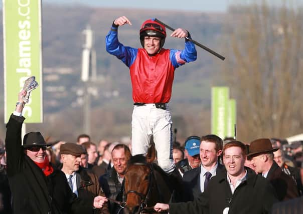 Jockey Ruby Walsh celebrates on Quevega after victory in the OLBG Mares' Hurdle (Picture: David Davies/PA Wire).