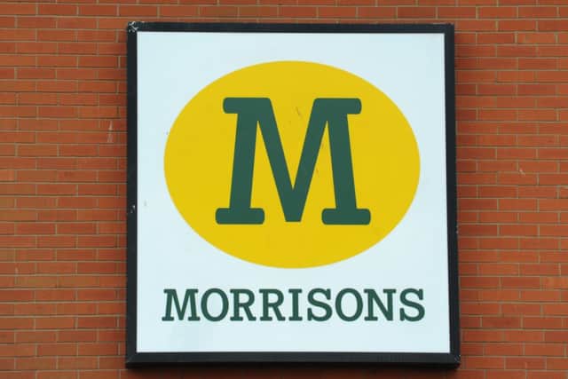 Morrisons slumped to an annual loss million amid falling sales