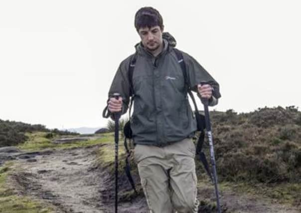 Liam Garcia training at  Burbage Edge, Peak District, for his record breaking walk