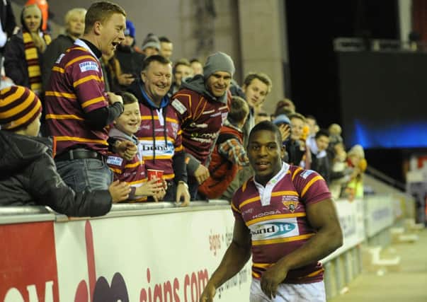Huddersfield Giants' Jermaine McGillvary celebrates with the supporters