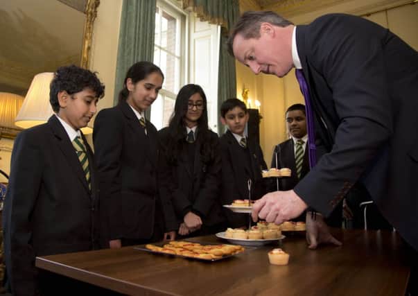 David Cameron meets children who baked cakes to raise money for Sport Relief, during a Sport Relief reception at Downing Street