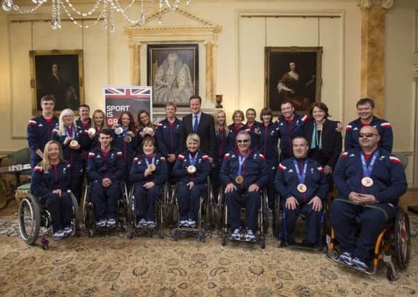 David Cameron and Secretary of State for Culture, Media and Sport Maria Miller with the Winter Paralympic Team GB at Downing Street