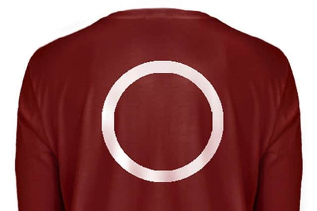 A computer generated image of the distinctive burgundy long sleeve top worn by a man that detectives investigating the disappearance of Madeleine McCann are looking for