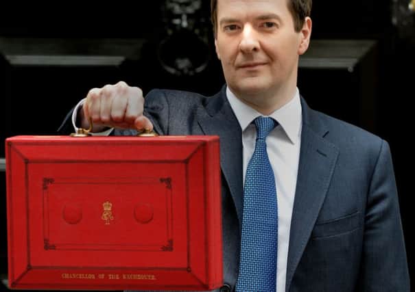 Chancellor of the Exchequer George Osborne outside 11 Downing Street before delivering his annual Budget statement.