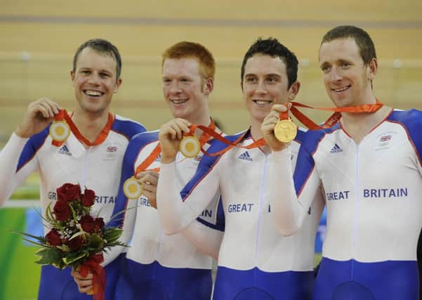 Paul Manning, Ed Clancy, Geraint Thomas and Bradley Wiggins with their Gold Medals after winning the Men's Team Pursuit at the Track Cycling Course at the Laoshan Velodrome during the 2008 Beijing Olympic Games in China.