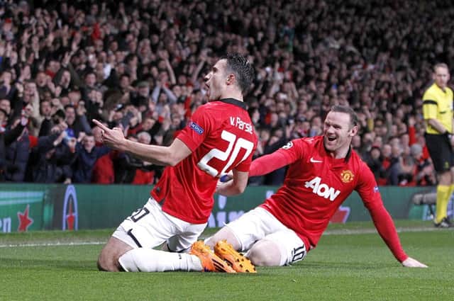 TURNING POINT: Manchester United's Robin van Persie celebrates with team-mate Wayne Rooney on Wednesday night.