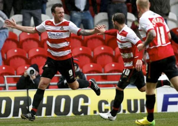 Chris Brown celebrates his goal against Sheffield Wednesday.