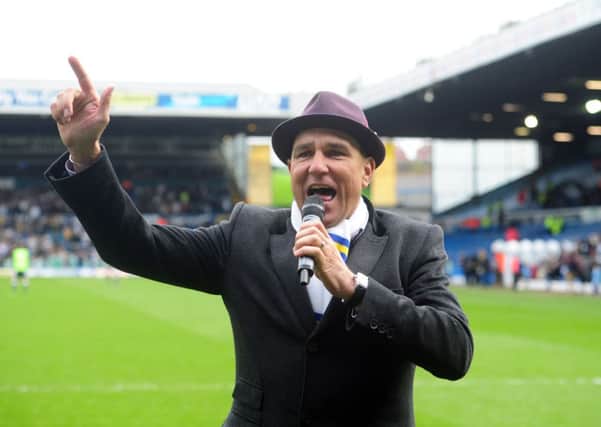 Vinnie Jones sings Marching On Together at Leeds United's match with Millwall.