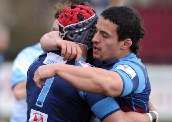Juan Socino celebrates with Jack Preece after his try.