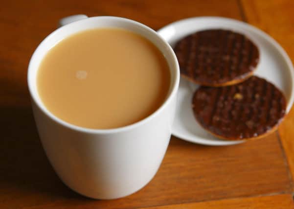 A cup of tea as the traditional office tea round is becoming extinct