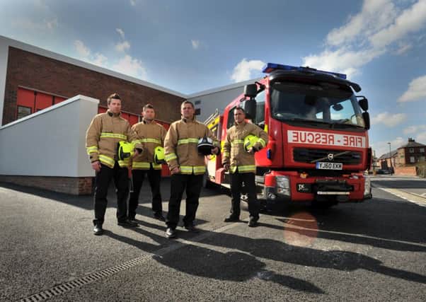 Firefighters Andy Daw, Steve Howles, watch manager Carl Vinand, and crew manager Russ Welburn. Picture: Bruce Rollinson