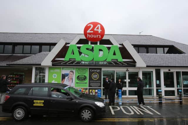 Police outside the Asda supermarket in Shipley. Pictures: Ross Parry Agency