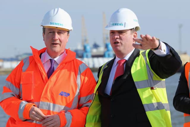 David Cameron and Michael Suess Chief Executive Officer of Siemens Energy, tour King George Dock in Hull