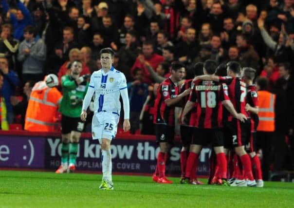 Dejected Leeds United players as Bournemouth score their third goal of the match.