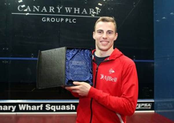 Nick Matthew poses with his PSA Player of the Year award. Picture courtesy of squashpics.com