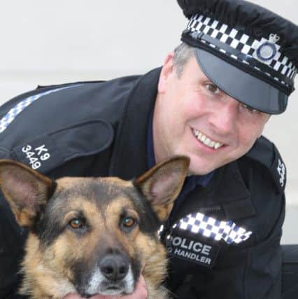 Gimley the six-year-old West Yorkshire Police dog survived a 40 foot fall chasing a criminal with his handler PC Tim Yates on the outskirts of Leeds. Pictures: Ross Parry Agency