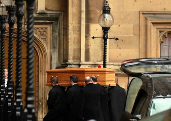 Tony Benn's coffin arrives at the Palace of Westminster to be placed in the Chapel of St Mary Undercroft.