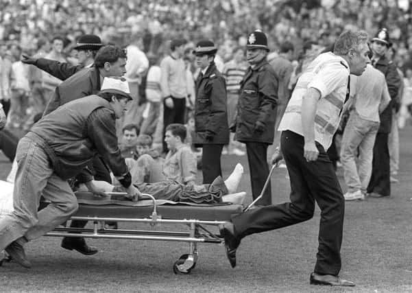 A scene of chaos at Hillsborough, 1989.