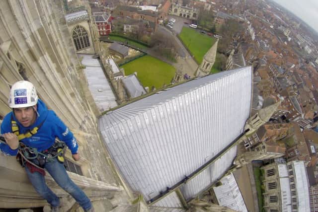 Abseiling conservation work at York Minster. Picture: Ross Parry Agency