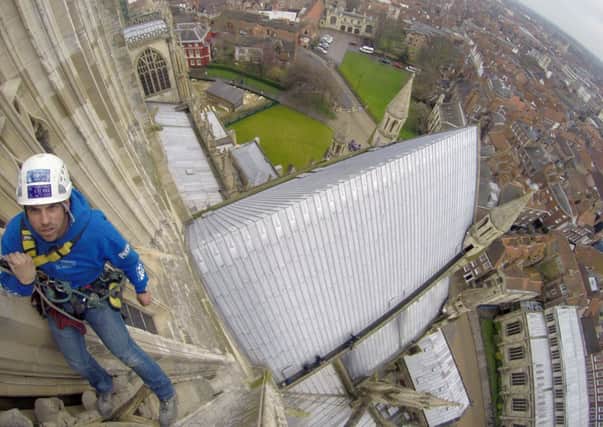 Abseiling conservation work at York Minster. Picture: Ross Parry Agency