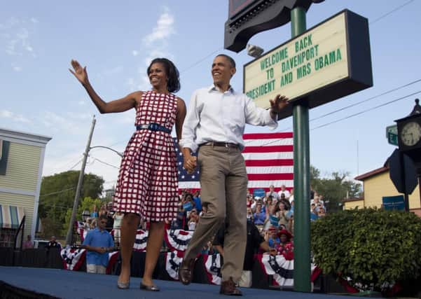 President Obama and first lady Michelle at a campaign event