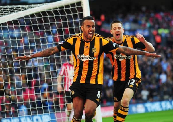 Hull City's Tom Huddlestone celebrates his goal with Matty Fryatt (Picture: Simon Hulme).