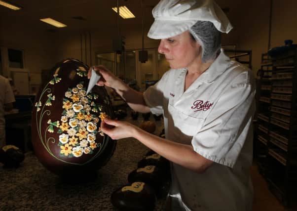 Josie Raine hand decorates Betty's Imperial Egg with spring flowers