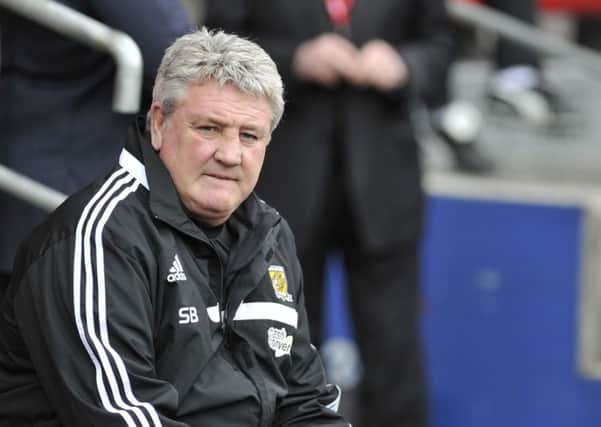 Hull City's manager Steve Bruce is one of Arsene Wenger's nominees for manager of the season.