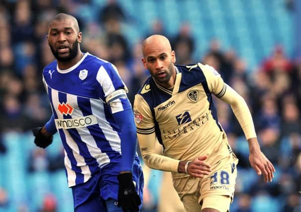 Reda Johnson, left, has been released by Sheffield Wednesday.