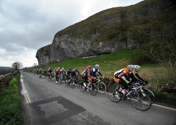 Riders try out the Tour de France route at Kilnsey Crag. Picture by Simon Hulme