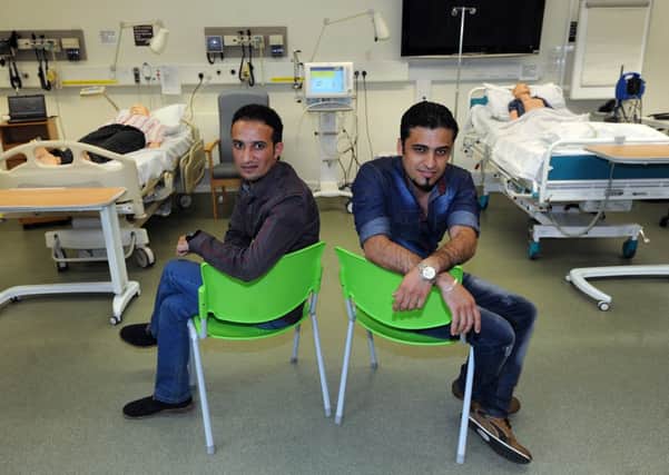 Iraqi nurses Mohammed Al Duraye and Mazin Maytham are currently studying art Sheffield Hallam University