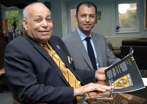 Hull City AFC owners Assem Allam and his son, Ehab.