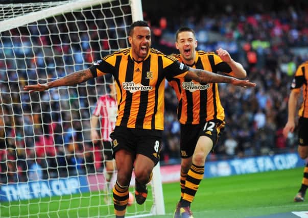 Hull City's Tom Huddlestone celebrates his goal Matty Fryatt in the semi-final against Sheffield United. Here, the SportsTalk panel preview the FA Cup final between the Tigers and Arsenal.